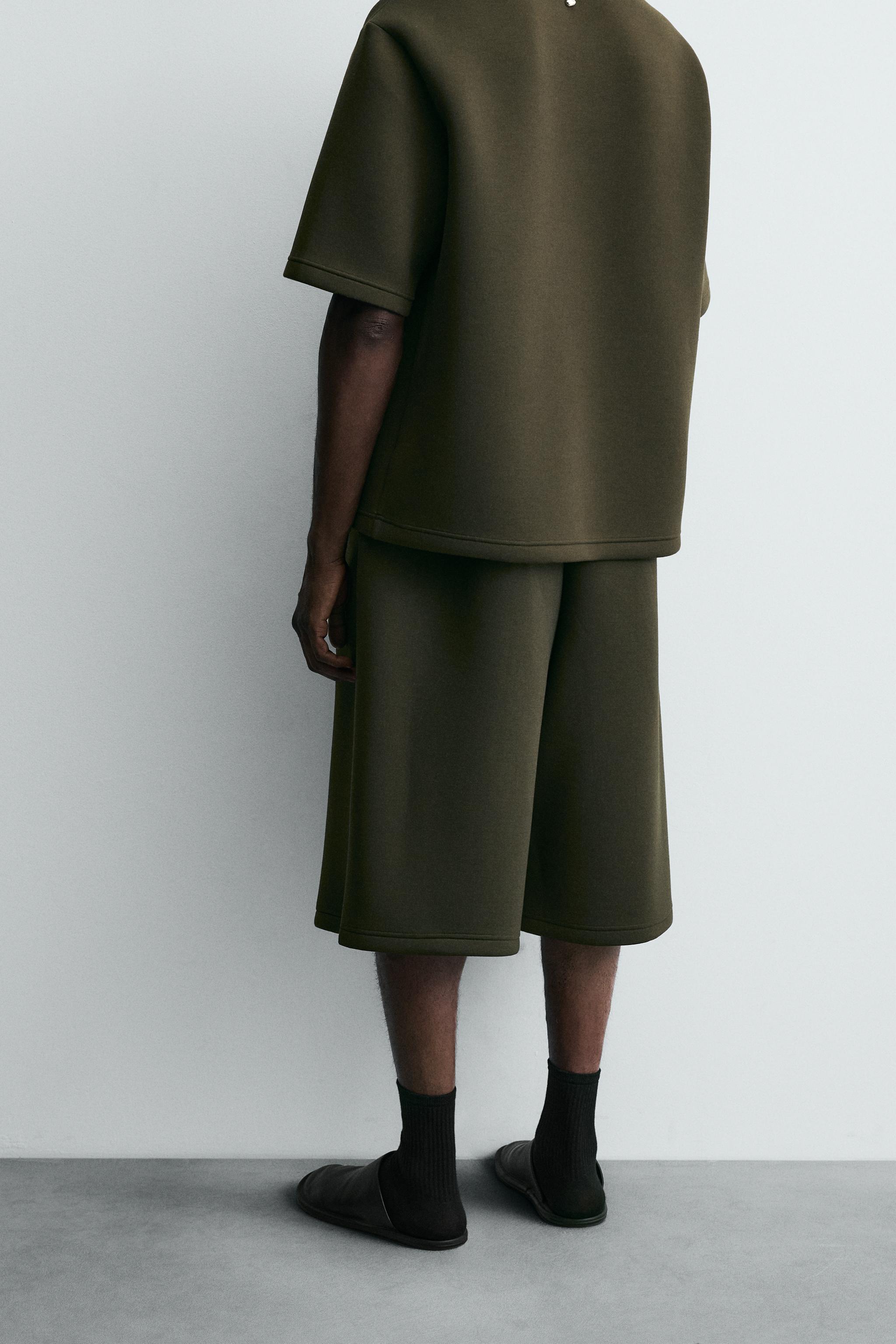 NEOPRENE EFFECT SHORTS WITH DARTS